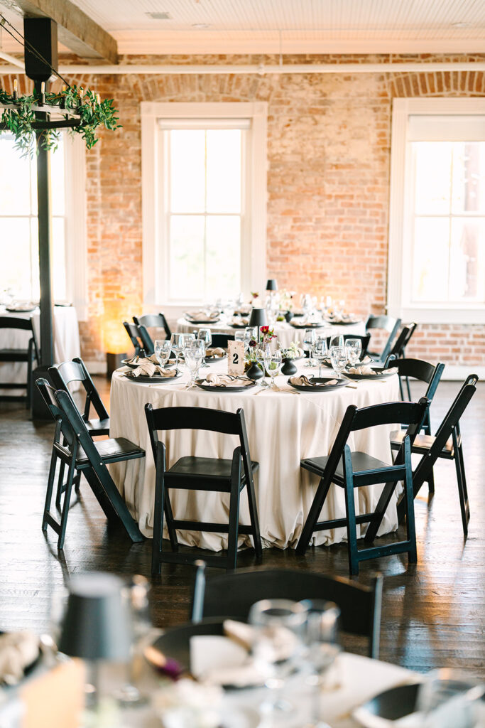 A moody and bold indoor Station 3 Houston wedding reception