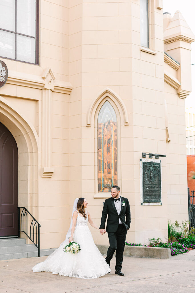 Bride and groom portraits from an elevated winter wedding in Galveston