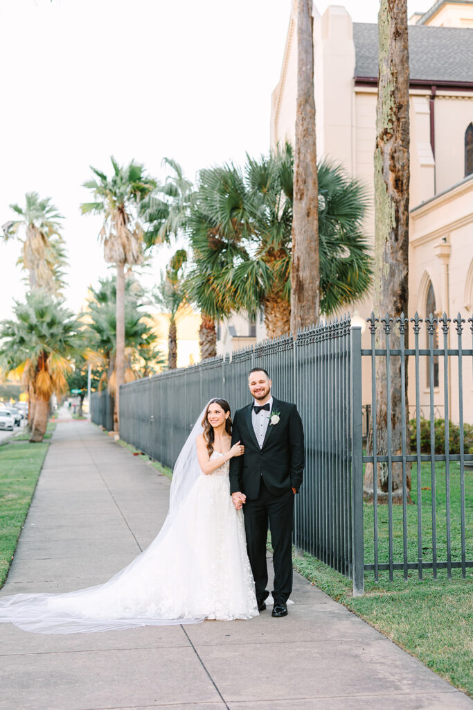 Bride and groom portraits from an elevated winter wedding in Galveston