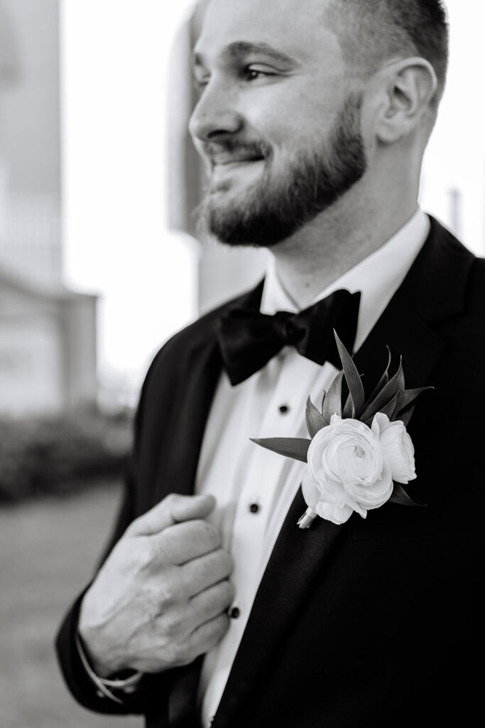 Groom portraits from an elevated winter wedding in Galveston
