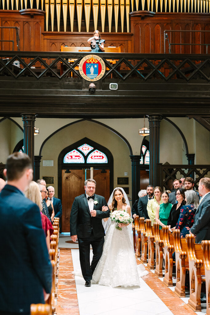 An indoor Catholic wedding ceremony in Galveston at St. Mary's