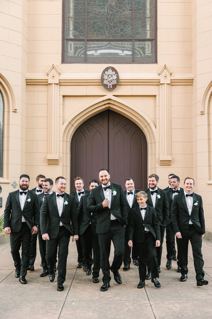 Groom and groomsmen photos from a wedding in Galveston, Texas