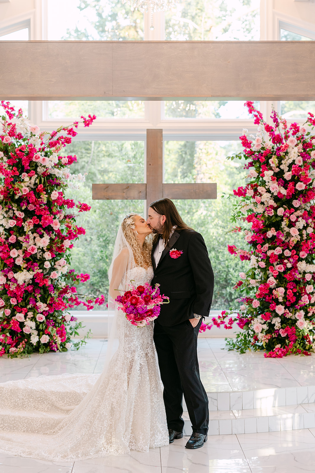 bride and groom take wedding portraits at sandlewood manor houston