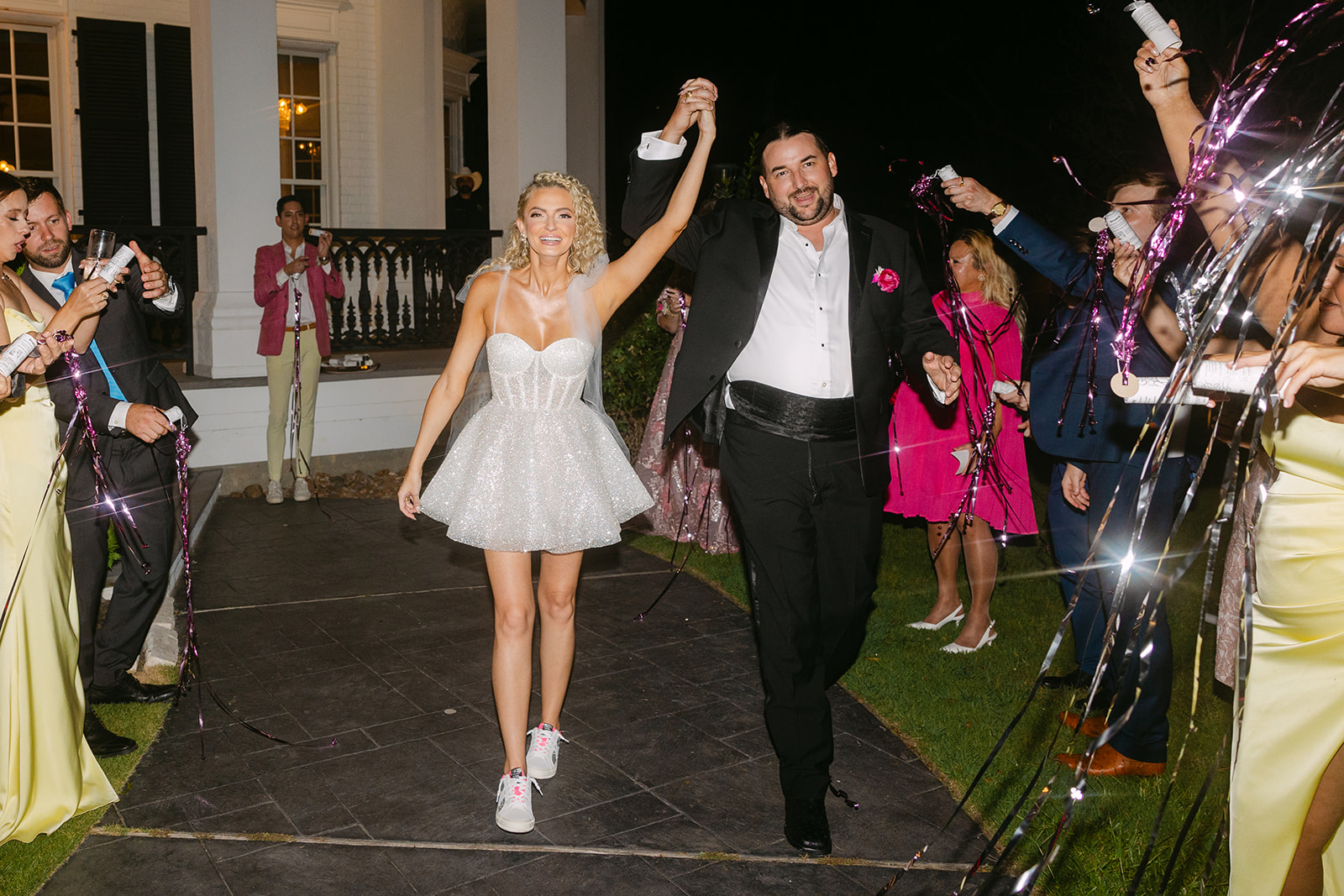 a group of people dancing on a dancefloor for a wedding
