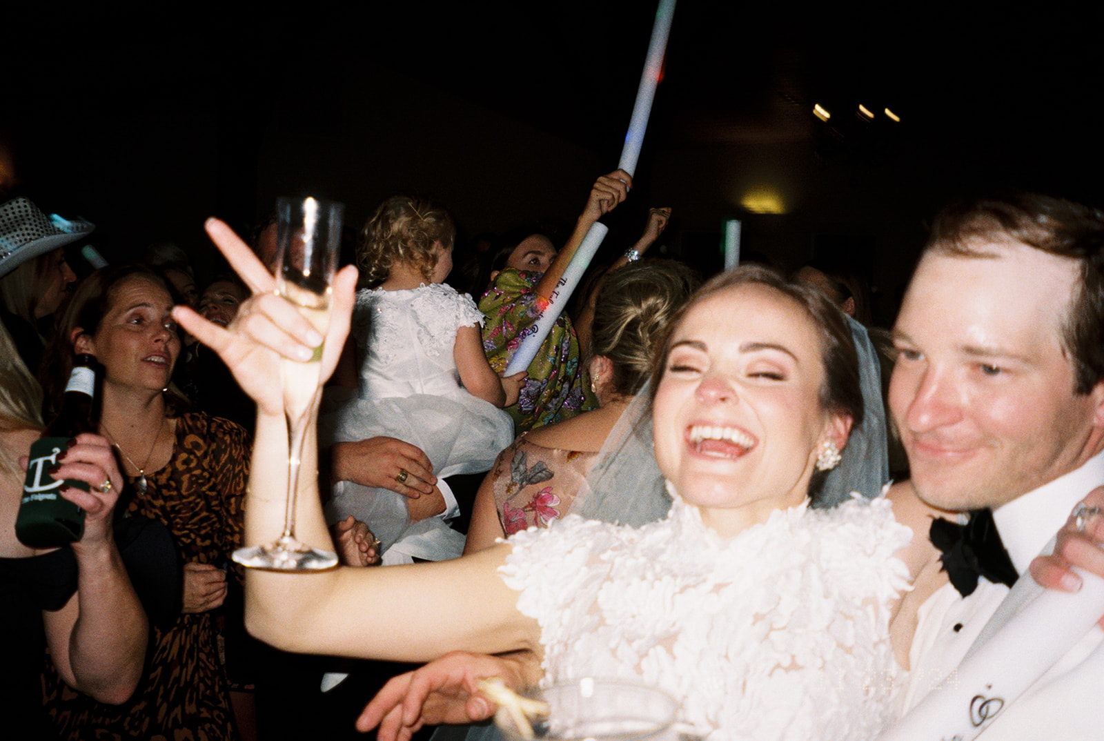 wedding guests having fun on the dance floor for a wedding