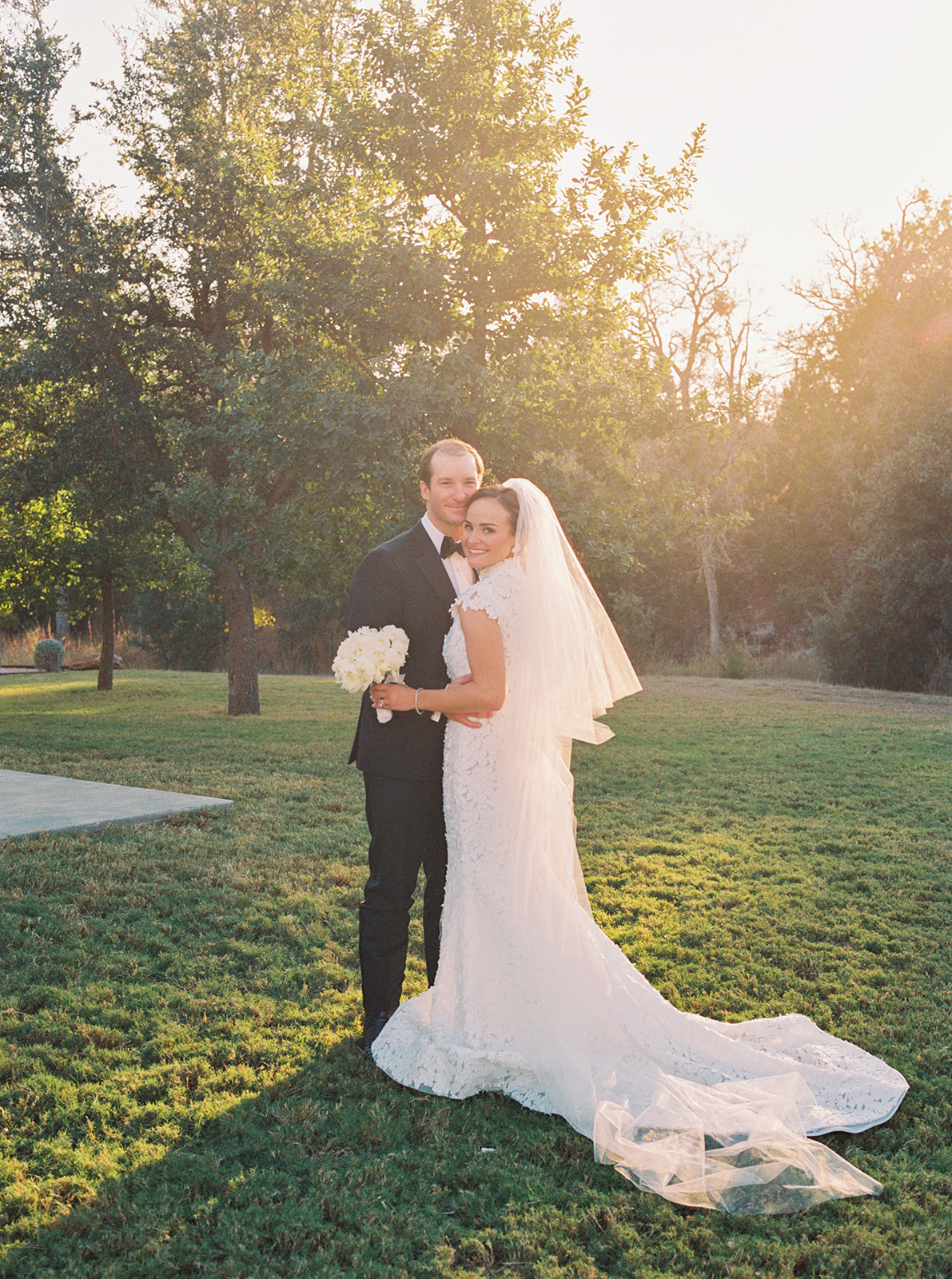 bride and groom take wedding portraits at La Bonne Vie Ranch