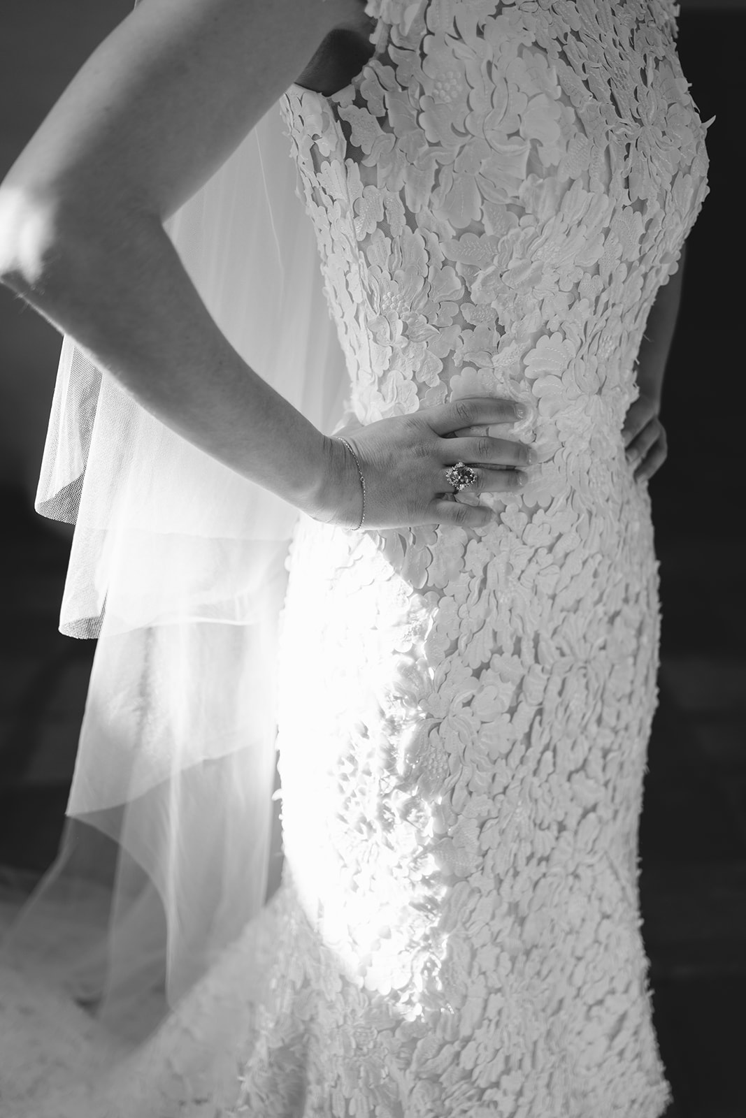 bride does a first look with her family members before wedding ceremony