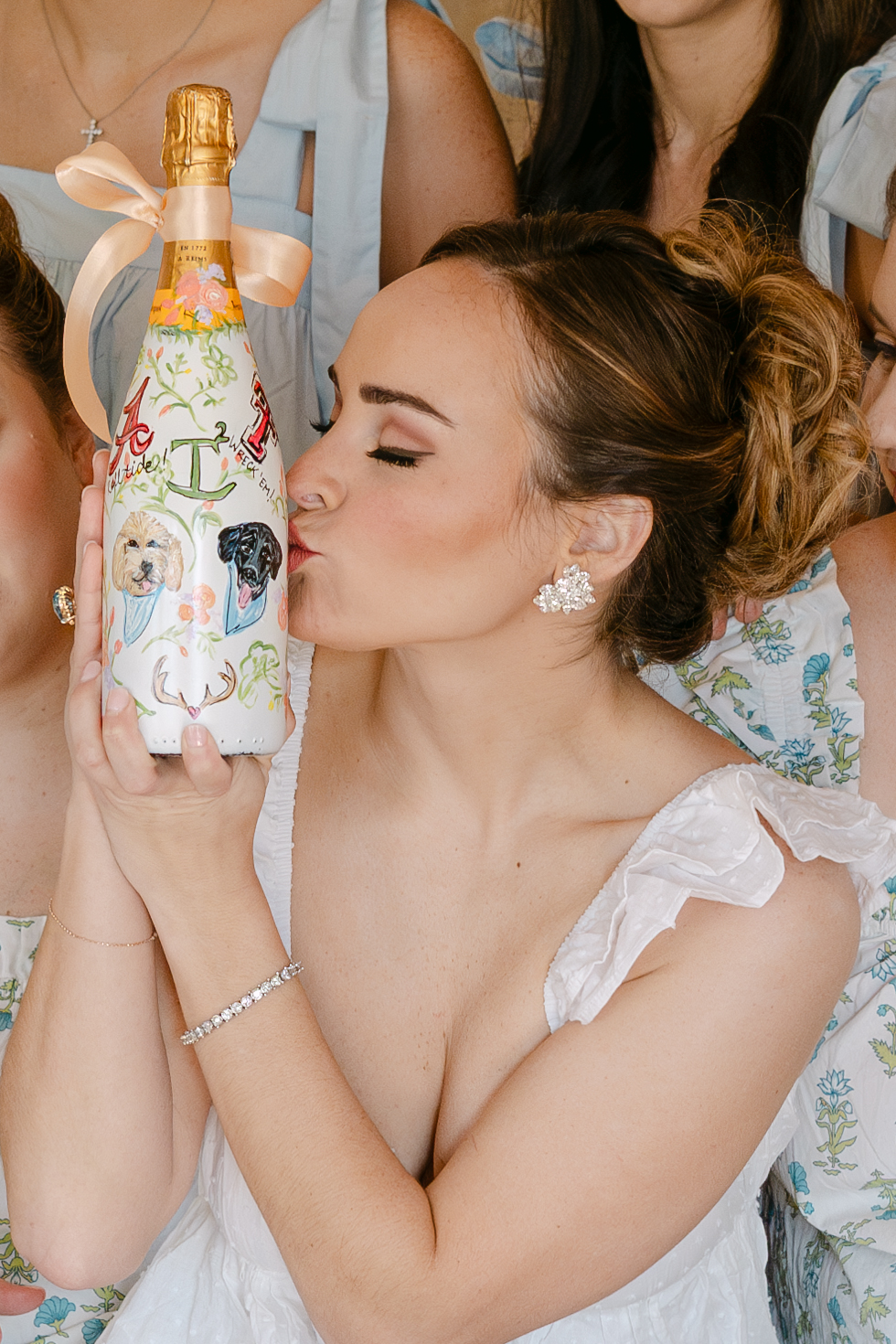 bride getting ready with her bridesmaid on her wedding day at La Bonne Vie Ranch
