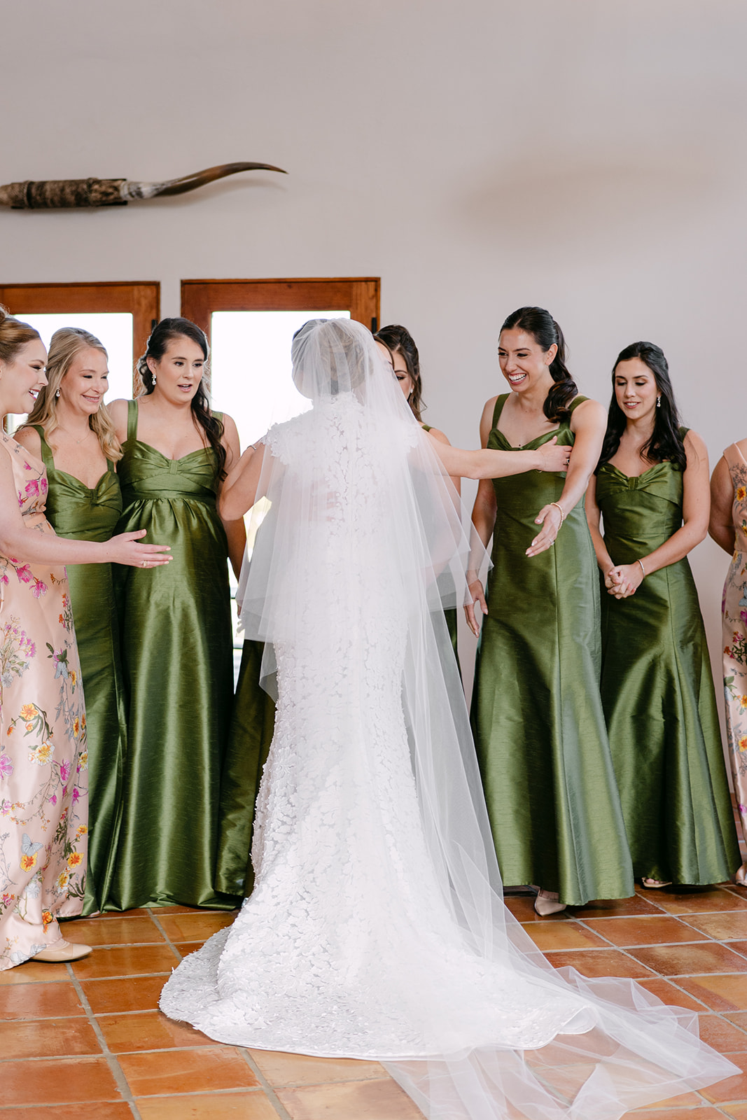 bride does a first look with her bridesmaids