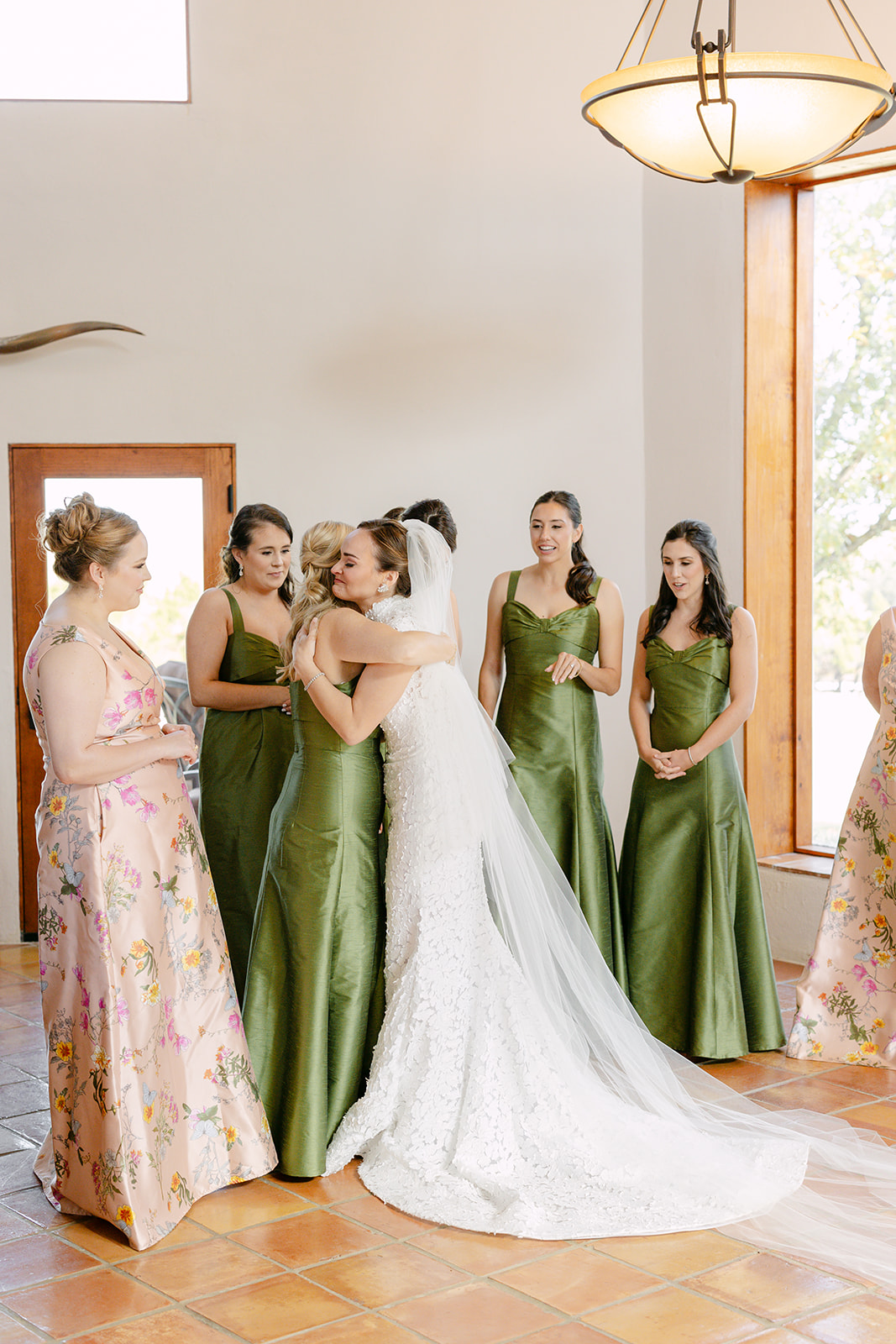 bride does a first look with her bridesmaids