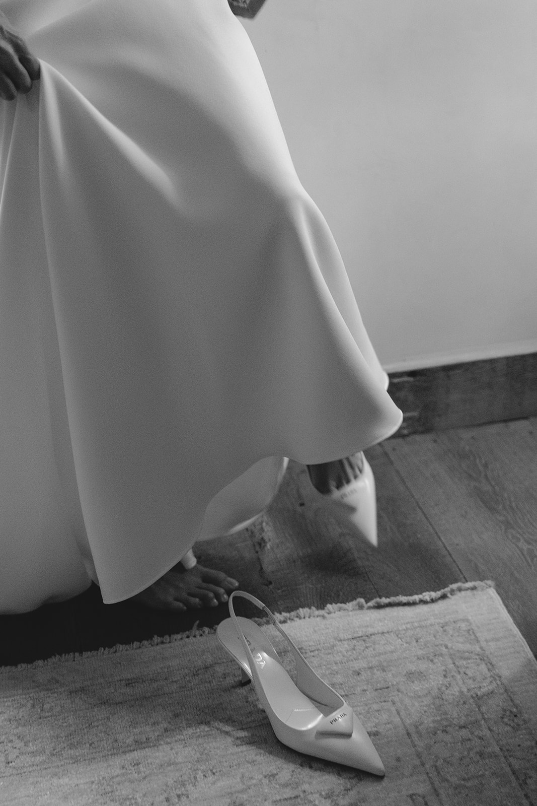 bride getting ready for her wedding with her bridesmaids