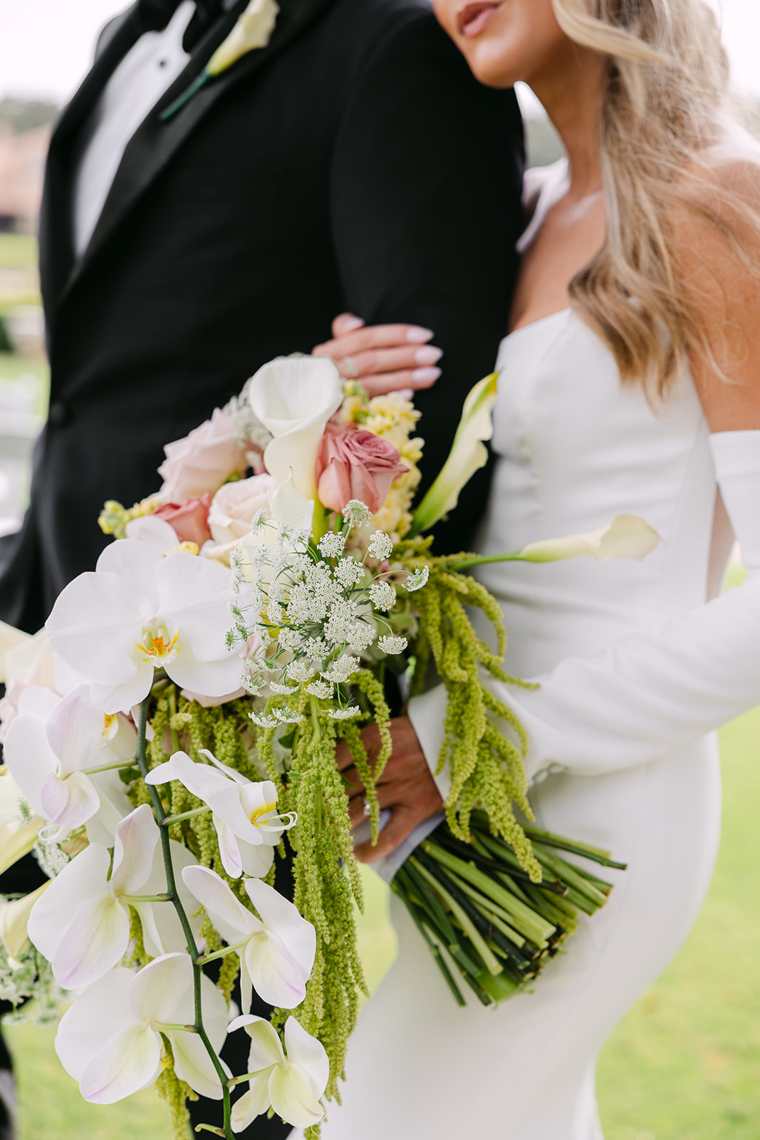 Bride and groom take wedding portraits at their wedding at The Houston Oaks Country Club