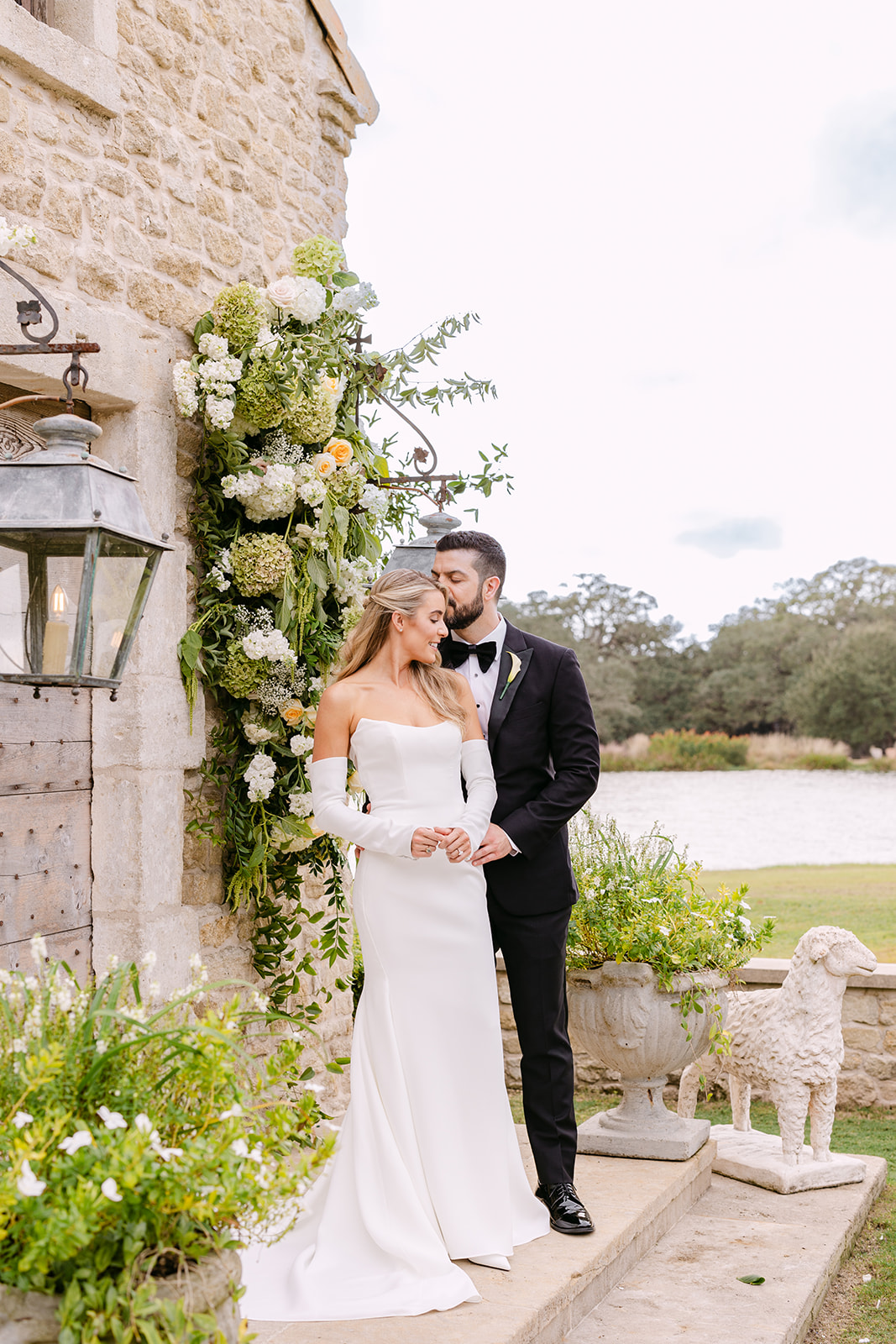 Bride and groom take wedding portraits at their wedding at The Houston Oaks Country Club