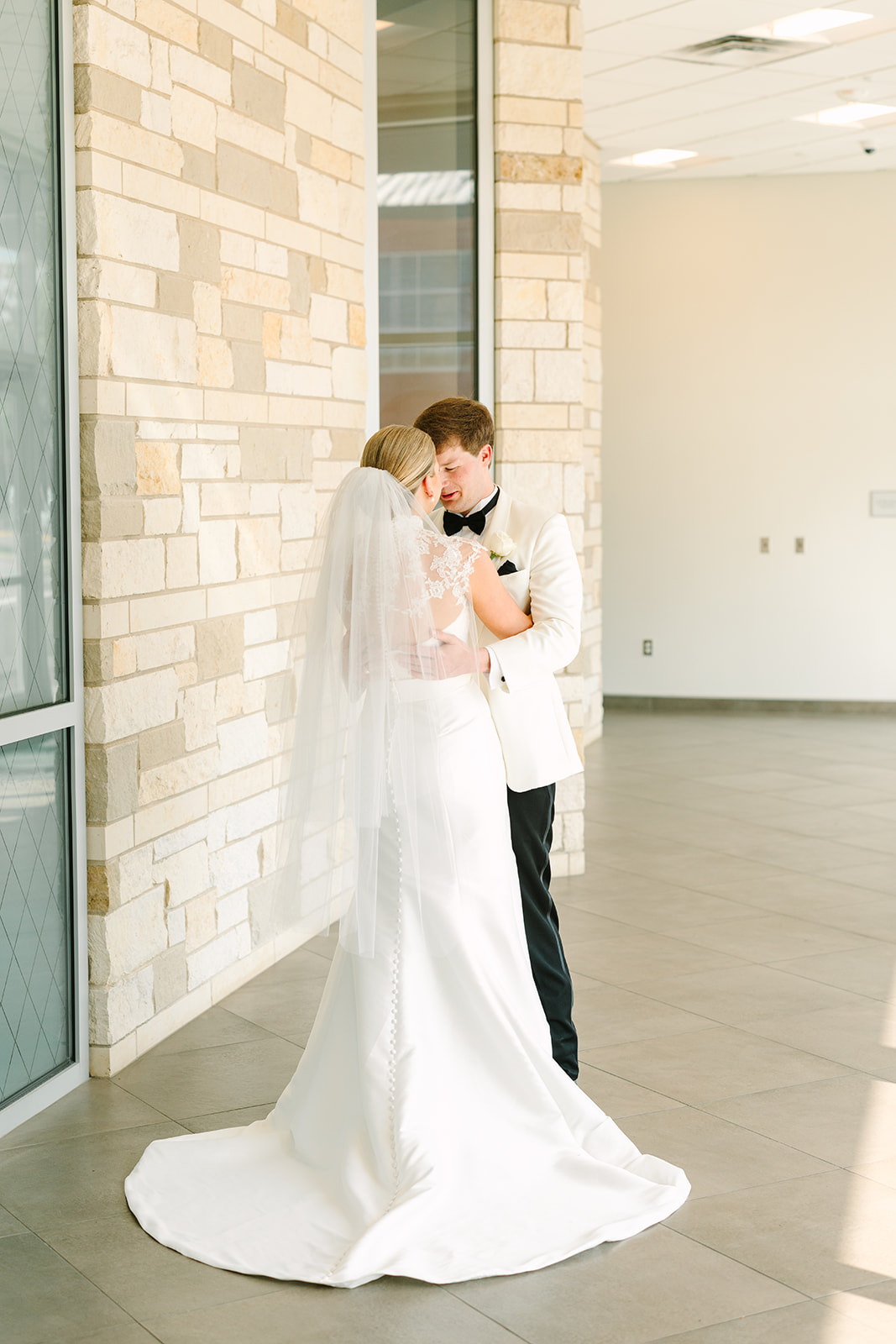 couple having a first look at their wedding at Braeburn Country Club