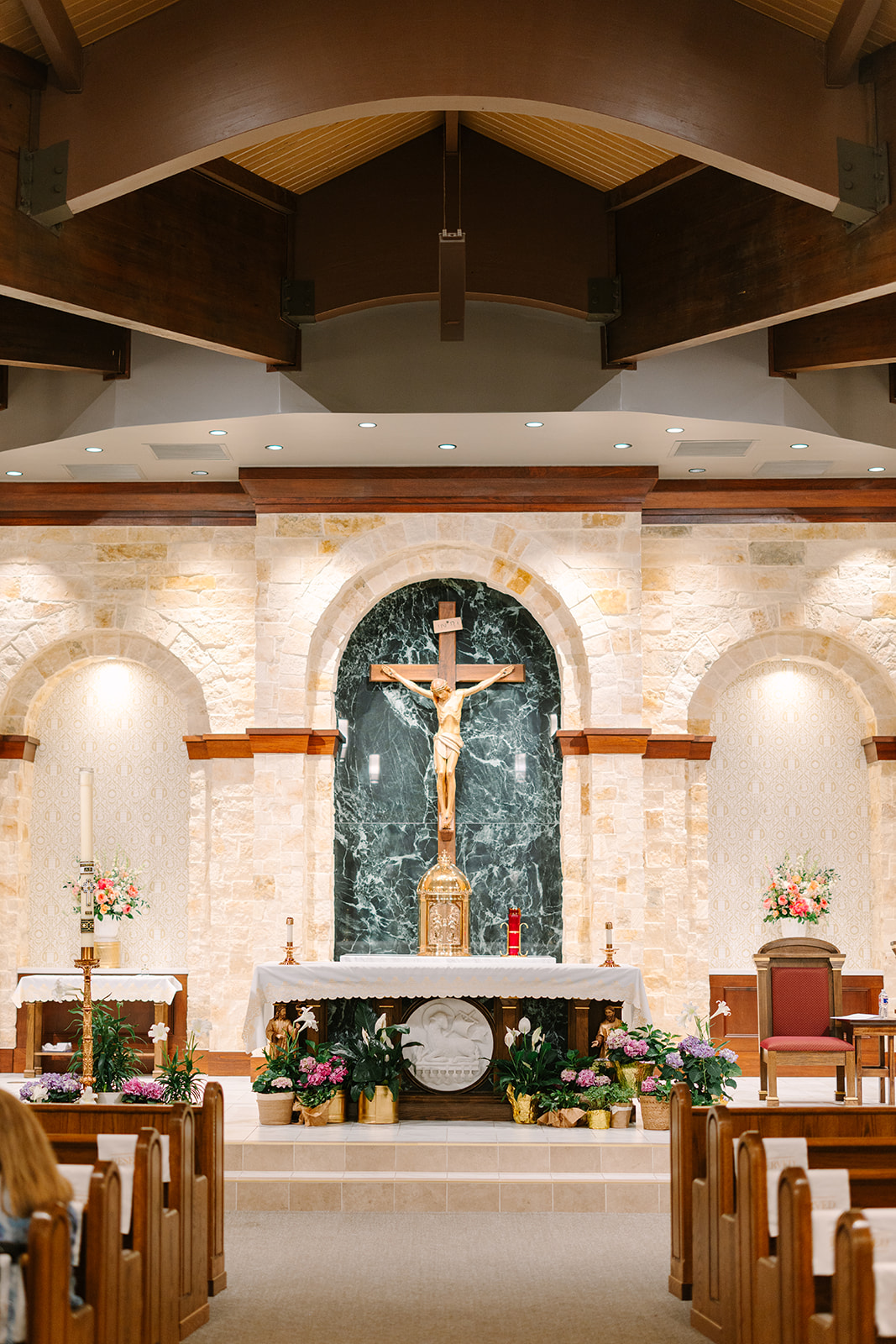 a pink summer wedding ceremony at a catholic church 