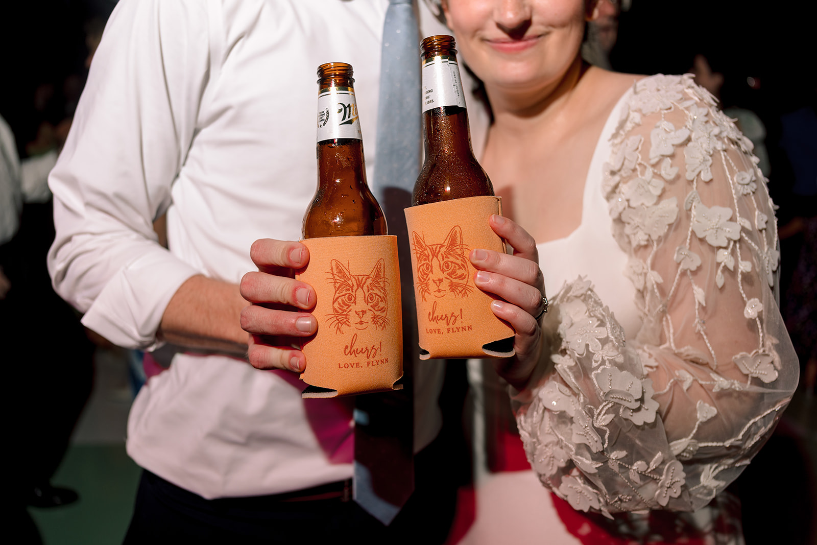 People dance together at a lively indoor event. 