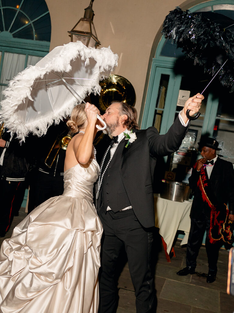 cute picture of the newlyweds kissing