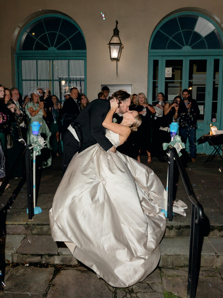 cute picture of the newlyweds kissing