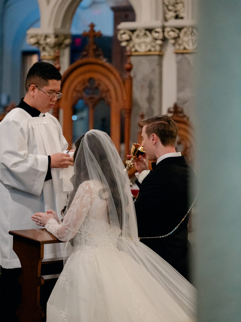 cute picture of the bride and groom during their intimate wedding ceremony