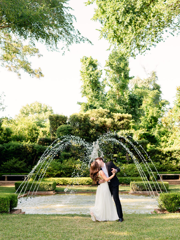 portrait of the newly engaged couple kissing
