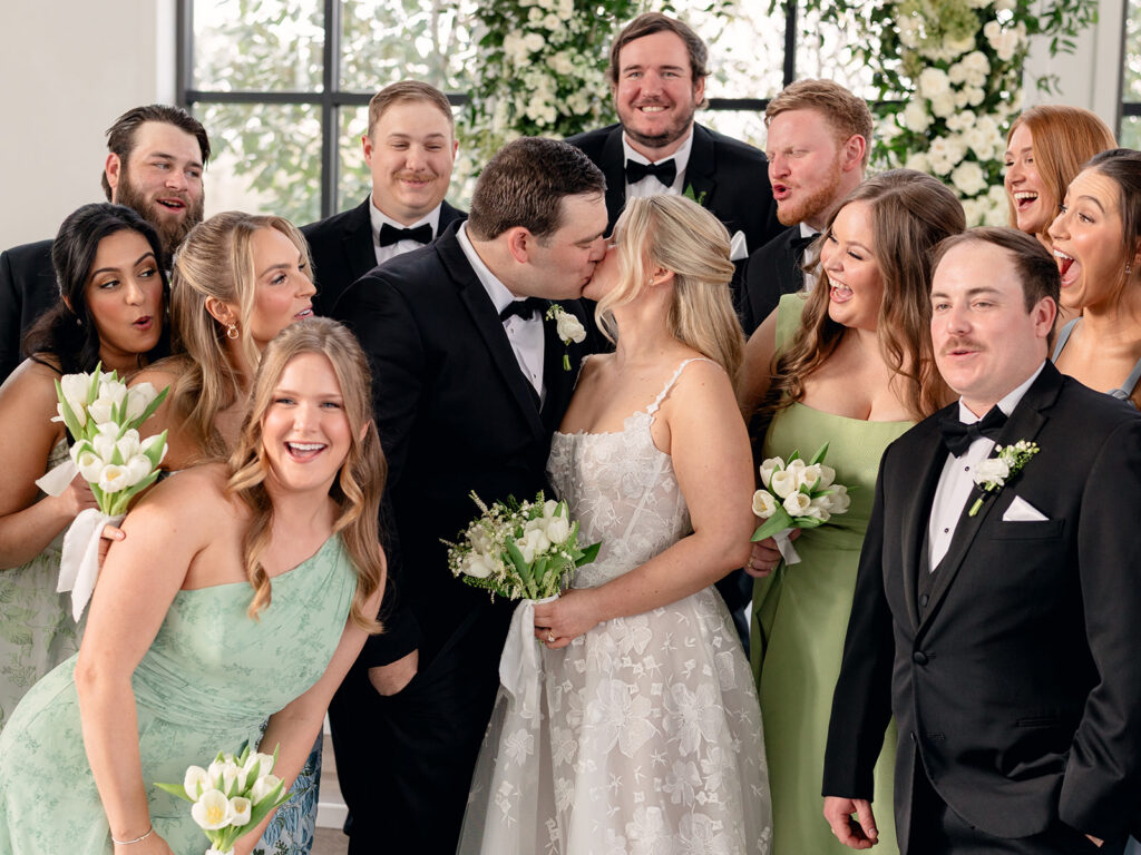 cute picture of the newlyweds kissing