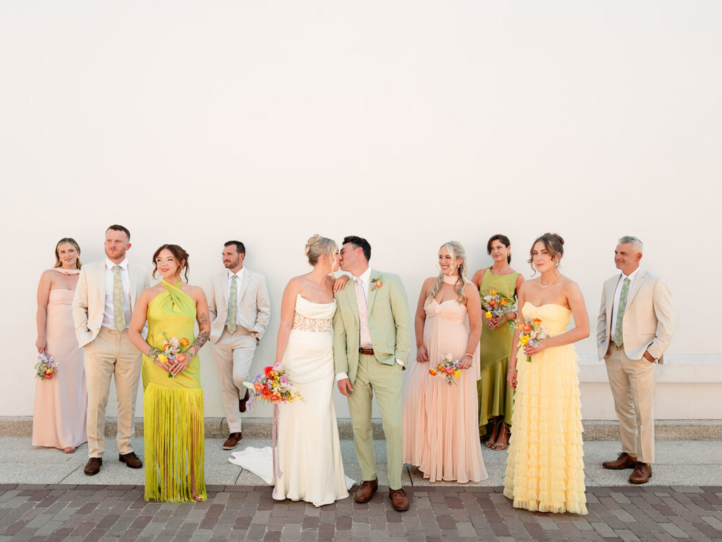 Picture of the bride and groom with their bridal parties