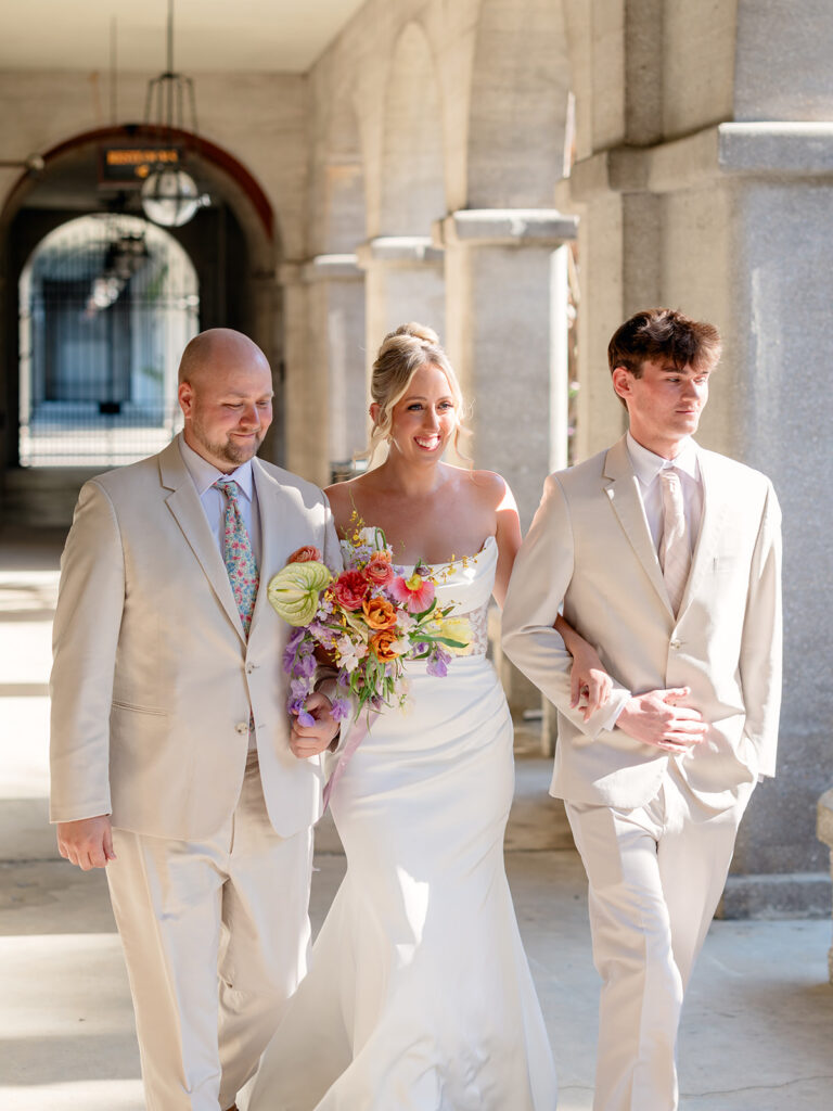 Cute portrait of the bride walking down the aisle