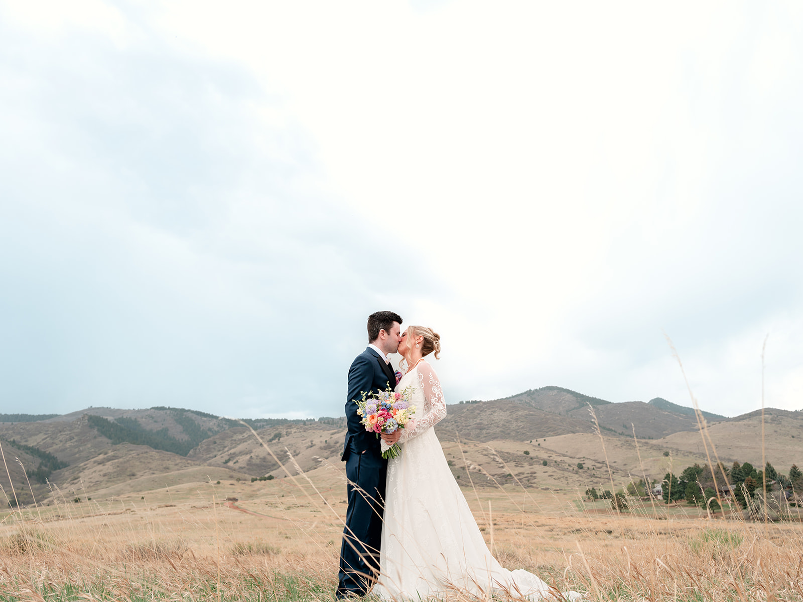 cute picture of the newlyweds kissing