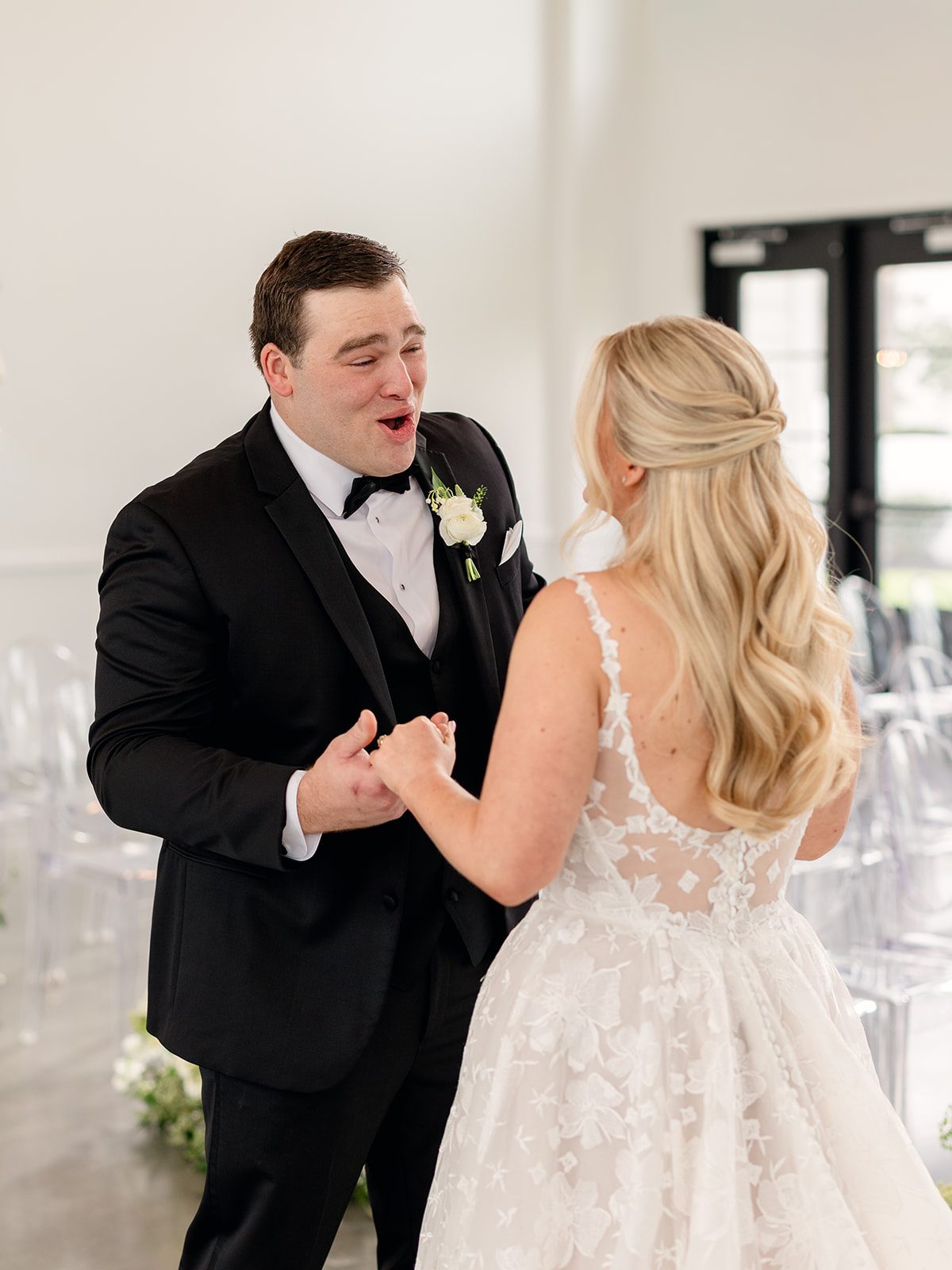 Bride's first look with her dad at a Boxwood Manor wedding in Tomball, Texas