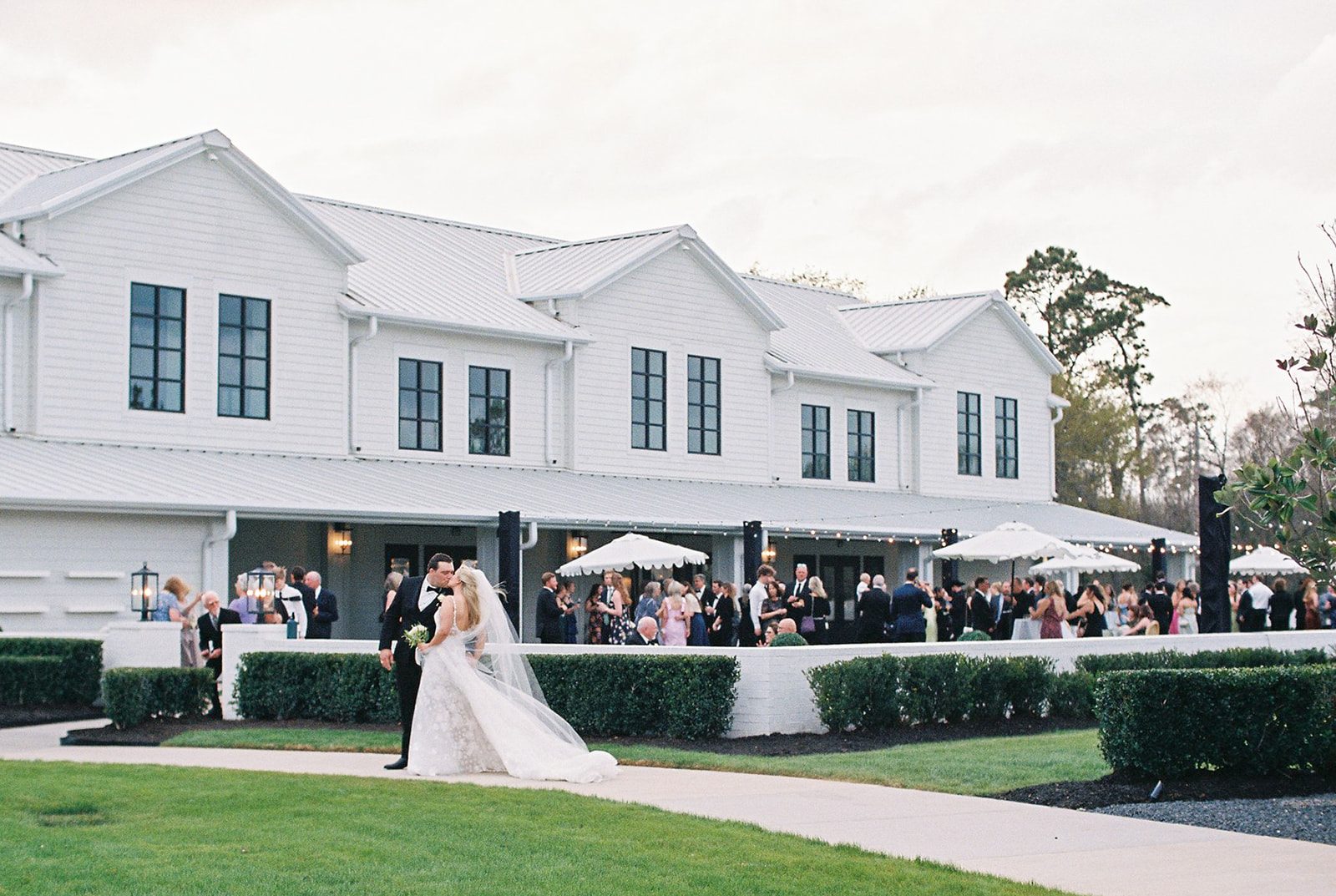 Bride and groom portraits at Boxwood Manor in Tomball, Texas
