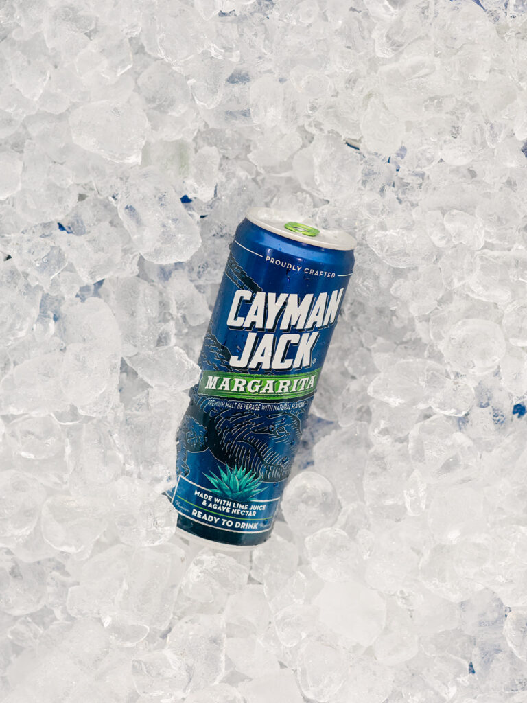 Canned cocktail on ice in the canoe drink station at the rehearsal dinner
