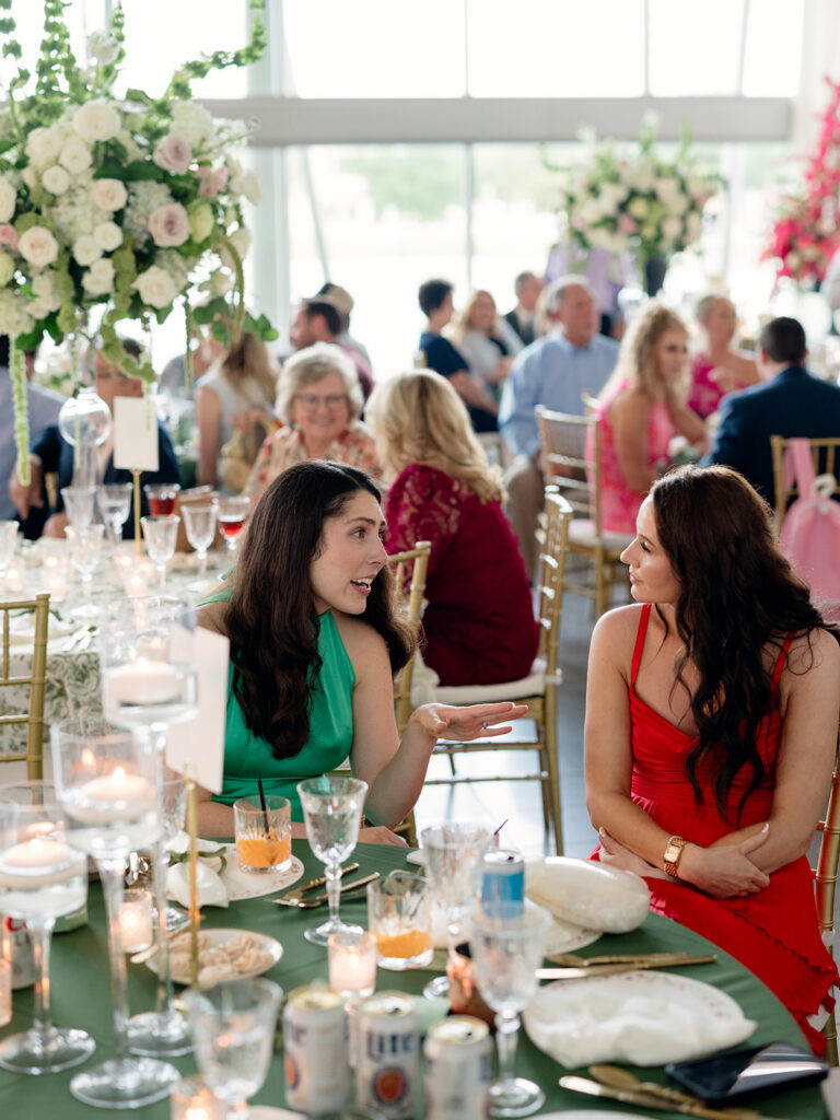 Guests chatting during dinner at the reception