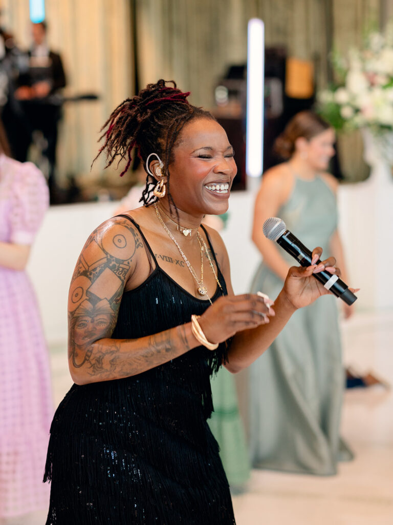 Band singer smiling on the dance floor