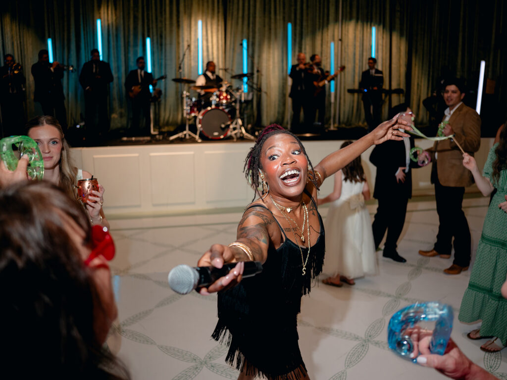 Band singer dancing with guests